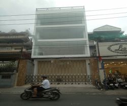  ??cho thue toa nha mat tien duong le quang dinh phuong 5  8 x 24 gia 55 trieu lau 