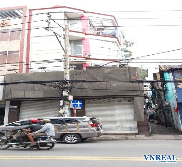 cho thue nha mat tien vo van tan quan 3