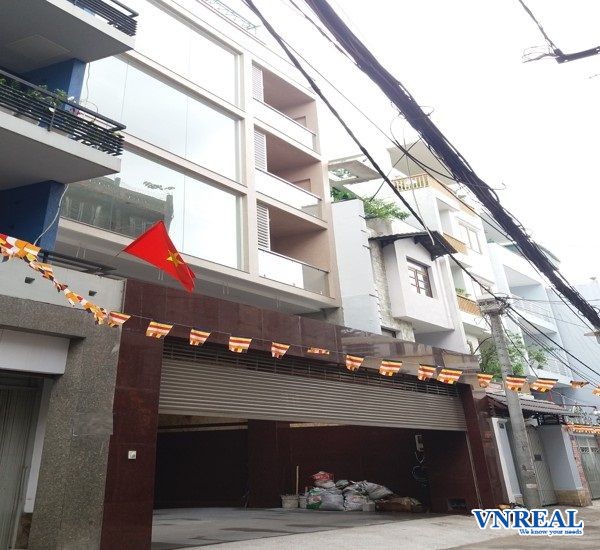 cho thue toa nha hem xe hoi cach mang thang tam quan 3